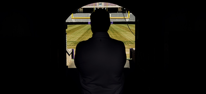 TCU coach Sonny Dykes looks out at Amon G. Carter Stadium.
