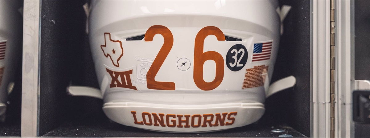 Texas honors late Cedric Benson with No. 32 sticker on football